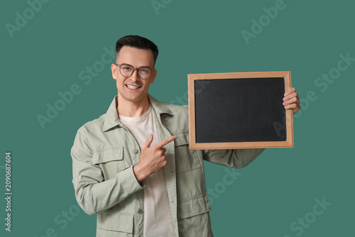 Male teacher pointing at ch...