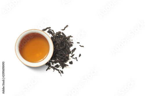 Fotografía Cup of a Chinese tea Da Hun Pao on a white isolated background