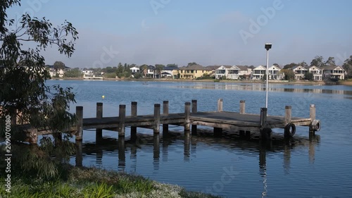 A lake and residential canal system within the master-planned estate of Sanctuary Lakes. Waterfront houses and luxury residential properties line the shoreline. Point Cook, Melbourne, Australia