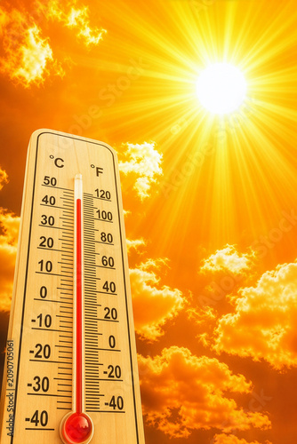 Hot weather - Summer heat background - Thermometer sky and sun rays 
