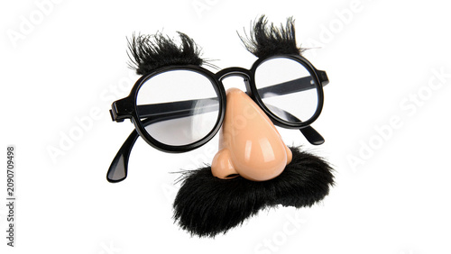 Fotografie Funny novelty disguise glasses with fake nose eyebrows moustache isolated on a t