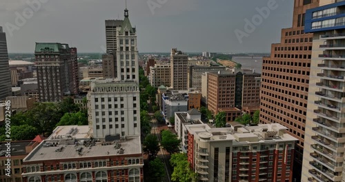 Memphis Tennessee Aerial v41 cinematic fly through downtown district along north main street capturing cityscape with historic buildings and mississippi river view - Shot with Mavic 3 Cine - May 2022