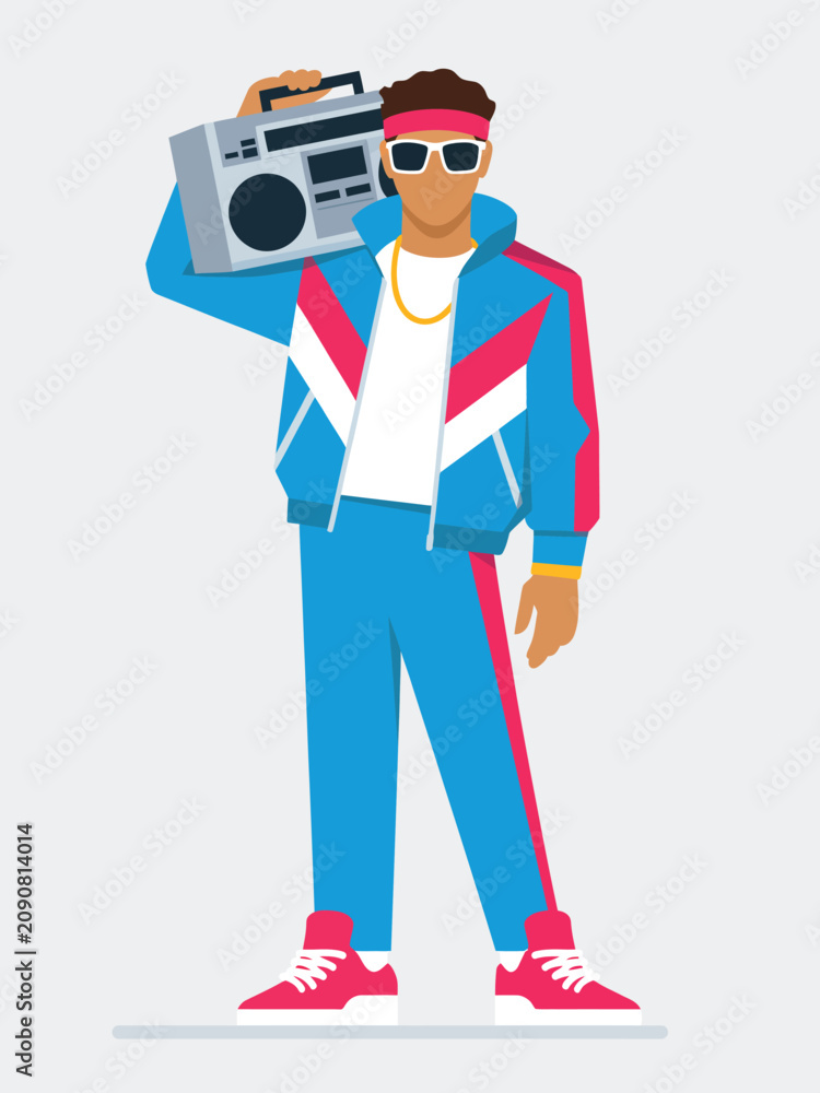 Fototapeta premium Man in a colorful retro tracksuit holding a large boombox on his shoulder