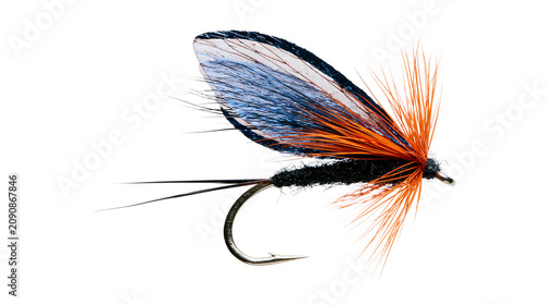 Obraz na plátně Detailed fishing fly lure with blue wings and orange hackle, isolated on transpa