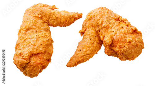 Foto Golden crispy fried chicken wings seasoned with spices, isolated on transparent