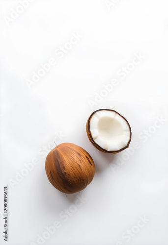 Two ripe coconuts one whole...