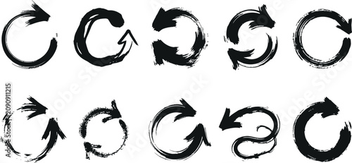 Fotografie Set of hand drawn circular arrow symbols for refresh and reload with circular sk