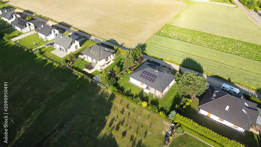 Fototapeta premium New residential district next to green woodland
