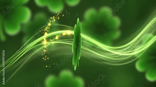 A vibrant four leaf clover centered on a glowing green background with light trails