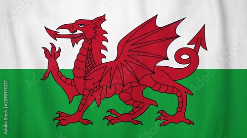 Wales national flag with red dragon on white and green field, symbolizing heritage, mythology, and cultural pride of the Welsh nation.