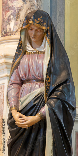 PISA, ITALY - JUNE 22, 2026: The carved polychrome statue of Virgin Mary at t...