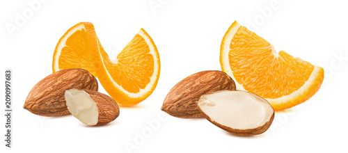 Almond nuts and orange slices isolated on white background. Real photography
