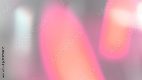 Tableau sur toile Abstract Pink and Orange Lens Light Streaks on Gray Background