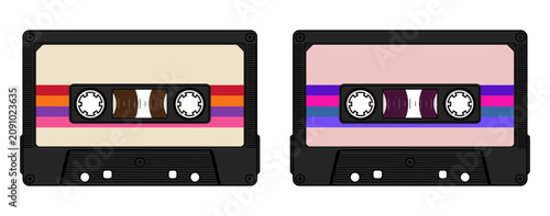 Two colorful cassette tapes with reels isolated on white background