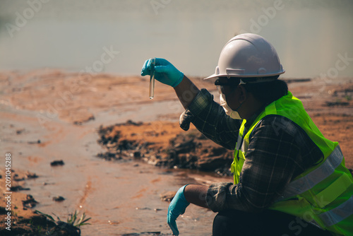 Laboratory-supported water sampling by environmental technicians to safeguard clean water resources.