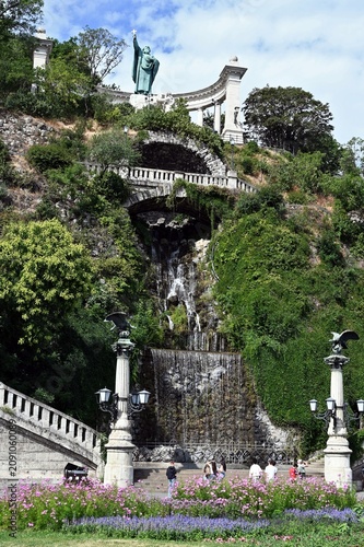 perspective view of the popular Gellert statue at the foot of the Gellert hill in Budapest, Hungary. religious monument. famous landmark. portrait orientation. travel and tourism concept. 