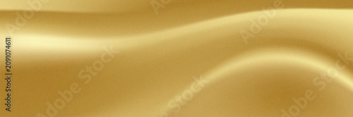 Fotografía Abstract luxury gold silk or satin fabric background with soft elegant wavy folds and smooth lighting texture