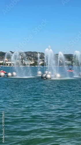 Zurich, Switzerland - June 25, 2026: Views of Lake Zurich, the historic city center, streets, public spaces and everyday life during a sunny summer day in Zurich.