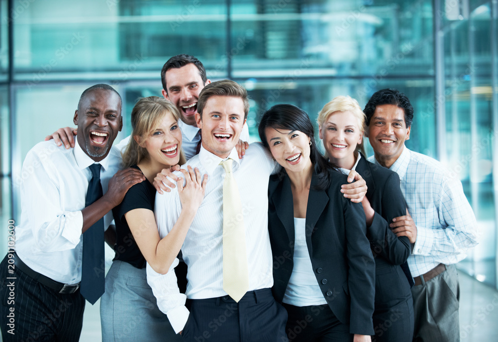 Obraz premium Portrait, laugh and diversity with business people at conference for community, solidarity and expo. Corporate seminar, tradeshow and partnership with employees in lobby for about us and team