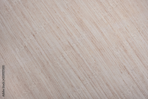 Photos Beige fabric texture. A beige background with a pattern of lines.