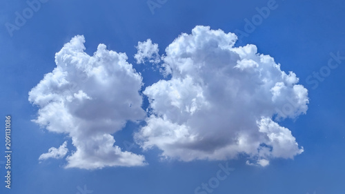 Structure of some cloud on the blue sky. White relaxed cottony form. Background serene sky. Fiber contours after rain. Lonely substance of water. Cumulus texture isolated on deep color backdrop.