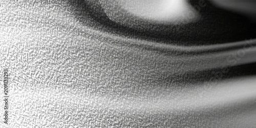 Foto Shiny silver metal surface texture with bright gradient light