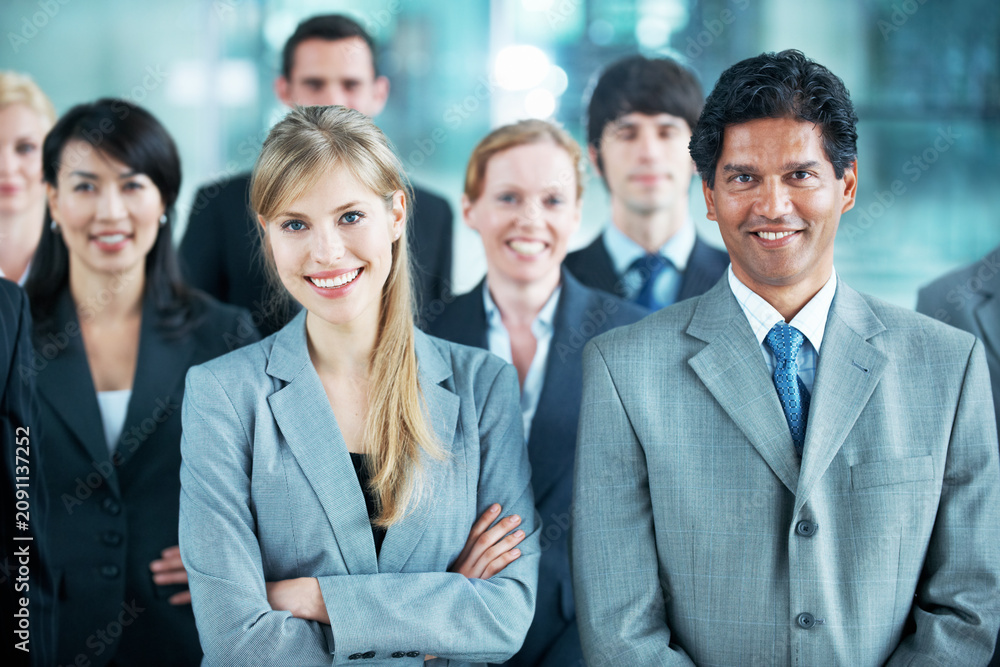 Fototapeta premium Portrait, happy and solidarity with business people in office for community, arms crossed or diversity. Synergy, support and partnership with employees in lobby for career, about us and mission