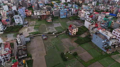 Aerial View of farming in between Dense Urban Neighborhood in Kathmandu Nepal	