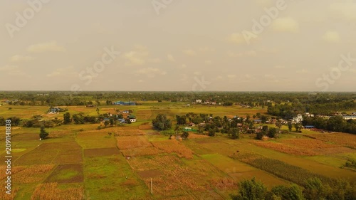 Wide Aerial View of Flat Farmland and Village in Nepal Terai	