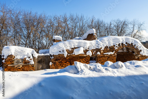 snowy ruined stable building in Nizhny Tagil