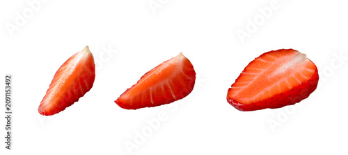 Juicy strawberry slices set isolated on transparent background. Many big bright berry pieces cut out. Shiny ripe fruit PNG. Photo image for sorbet, jam, ice cream, jelly, sweet drink packaging design