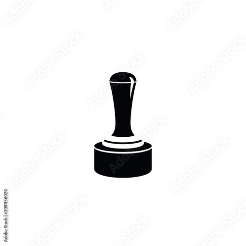 фотографія Black coffee tamper on white background.