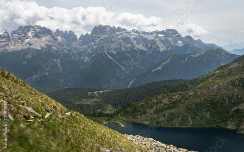 Panoramic view of the Brenta Dolomites above an alpine lake in Trentino, Italy