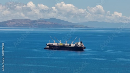 Aerial view of cargo ships in the Philippines. Mindanao. Zoom view.
