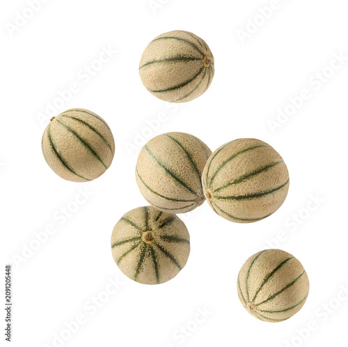 Принти на полотні Flying fresh raw ripe cantaloupe melon isolated on a white background