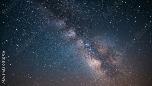 Stars Shine in the Sky During a Clear Night in a Remote Area Far From City Li...