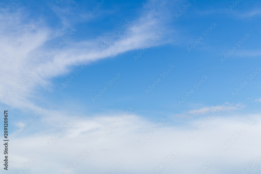 Fototapeta premium Sky replacement blue skies with white wispy serene clouds floating overhead