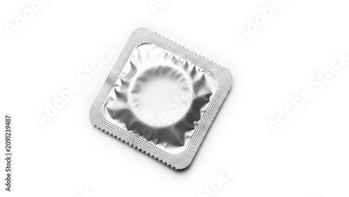 A single silver foil condom package for safe sex protection and family planning healthcare object