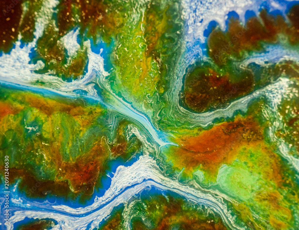 Naklejka premium Colorful abstract design with swirls and patterns in green, blue, and brown shades