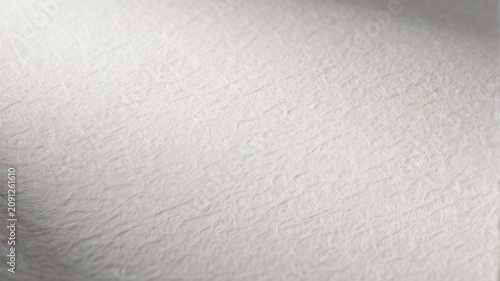 Die Makroaufnahme einer hochwertigen Papieroberfläche macht feinste Papierfasern und die natürliche Materialstruktur sichtbar.KI Generiert