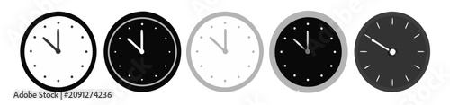 Photos Five clock faces with different colors and backgrounds showing time passing conc