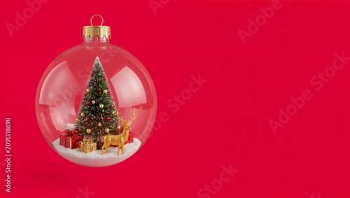 Christmas Decorations Inside a Glass Ornament With Gifts and a Golden Reindee...