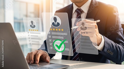 Businessman selecting a job candidate using a digital interface in a modern office environment