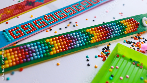 Children's crafts: diamond mosaic on handmade bracelets