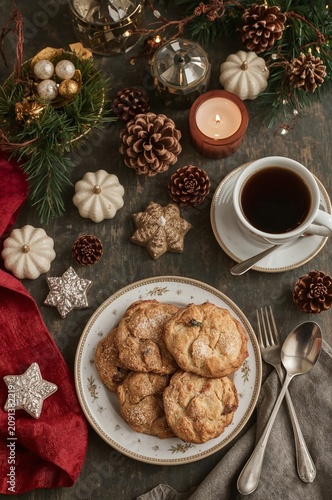Baked Cookies and Hot Coffee on a Table With Decorations During the Holiday S...
