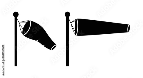 фотографія Two wind vanes with conical funnels a black silhouette against a white backgroun