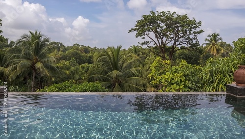 View of a Pool Surrounded by Trees in a Tropical Location on a Bright Day