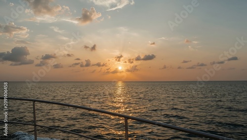 Sunset Over the Ocean Viewed From a Boat in the Evening