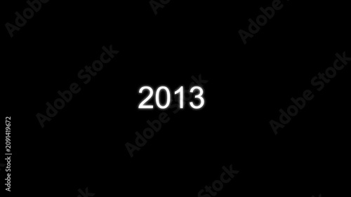 Bright white glowing numbers 2013 centered on a solid black background for new year celebration countdowns and future planning digital concepts