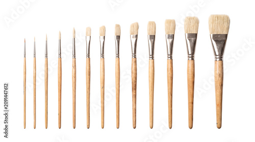 Fotografie Various Artist Paint Brushes in a Row Isolated on White